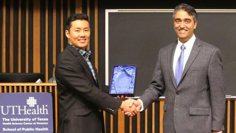 Tsai receives the R. Palmer Beasley, MD Faculty Award for Innovation from nominating faculty, Chair of the Department of Management Policy and Community Health, Aanand Naik, MD